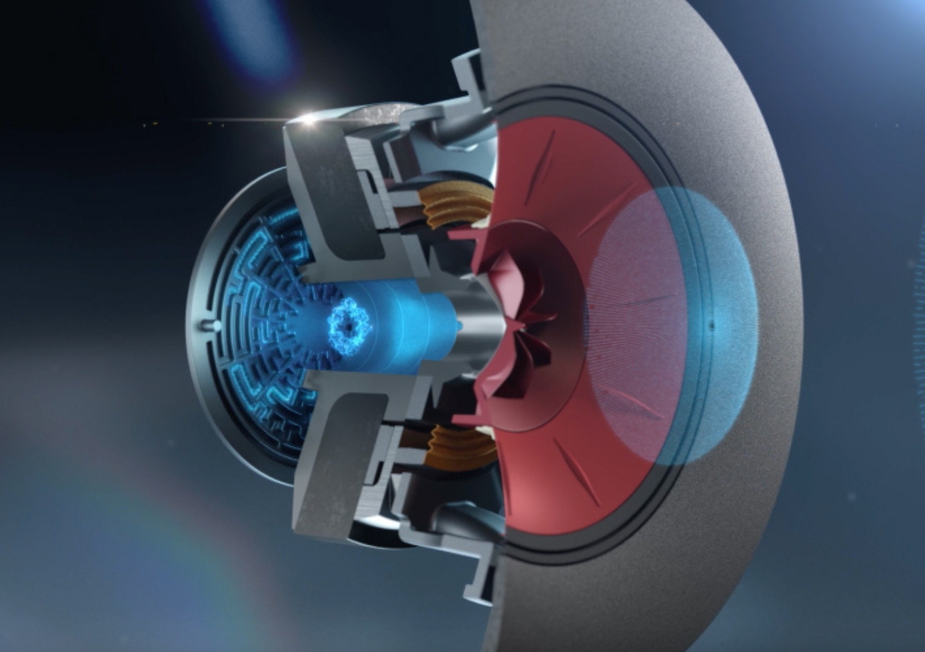 Illustration en coupe détaillée d’un haut-parleur KEF Uni-Q avec technologie MAT, montrant les guides acoustiques, la structure complexe de la chambre arrière et les éléments d’amortissement sonore.