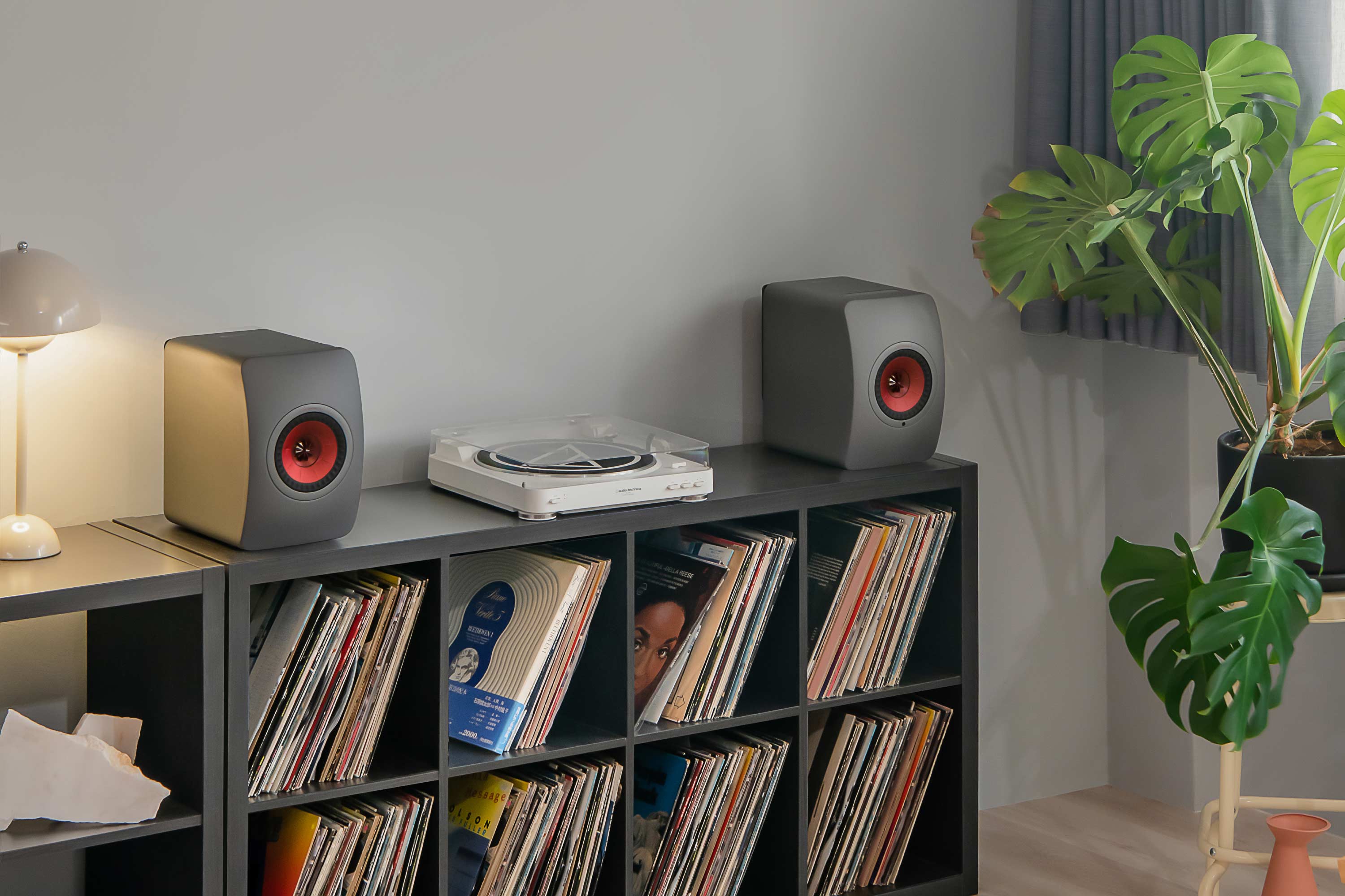 Turntable with wireless store speakers